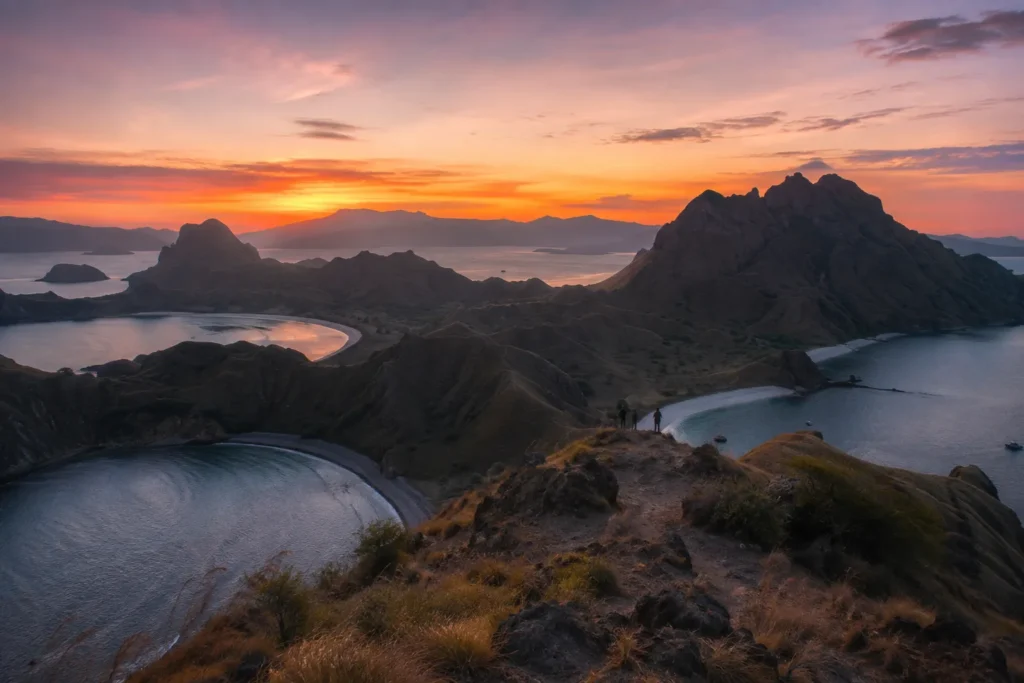 Tender running to shore at dawn from a phinisi anchored overnight in Komodo